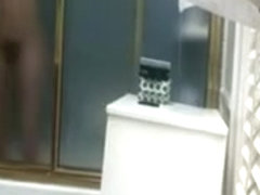 Brunette girl caught in bathroom by spy cam