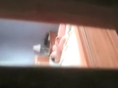 Spy cam sex video with doll dildo fucking nub on the bed