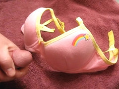 Neighbor girl`s rainbow bra