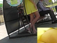 Pretty yellow dress and sexy upskirt thong panties