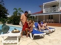 Foursome sex by the pool with two leggy chicks