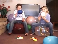 2 Girls Popping Balloons