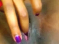 Latina black candy fingering on cam