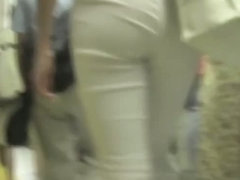 White semi-transparent pants on tight ass