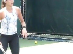 Tennis player wearing spandex pants