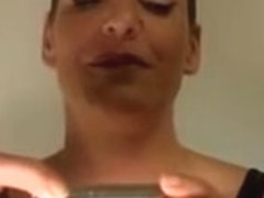 Hot looking dominatrix talks dirty over the webcam