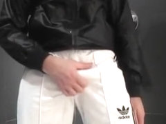 twink pissing in his Adidas tracksuit