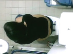 The piss cam records babe on toilet bowl from above