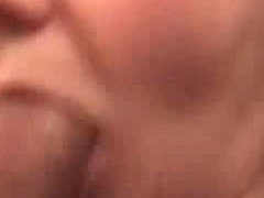 Hot mature wife sucking two big cocks in this homemade video