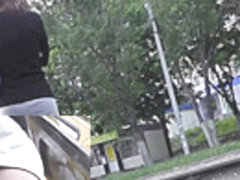 Amateur upskirt scene with a girl walking on the street
