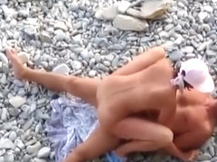 Nudist woman fucked in rocky beach