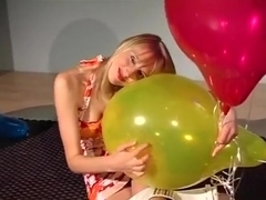 Sexy blonde destroy yellow balloon