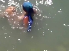 Voyeur busts nudists in the sea. that blowjob tasted salty for sure !!!