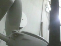 Two hot ass slits voyeured on the toilet spy camera