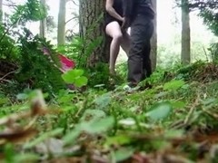 Horny couple fuck outside in the woods.