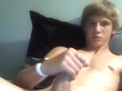 Cute blond boy strips and cums