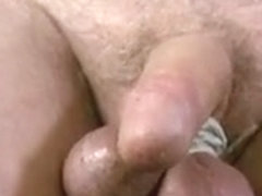 Close up views of a cumming cock