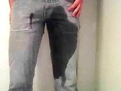 Boy pissing his pants and jerking off