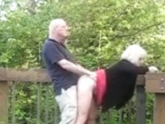 Mature couple fucking in public place