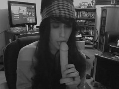 Crossdresser sucking dildo