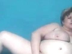 Big titted fat granny poses nude on webcam