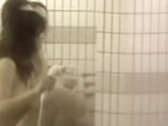 Busty Asian girlfriends spied taking the hot shower