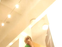 Candid asses and legs voyeured on dressing room camera