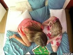 Two girls playing with their pussies