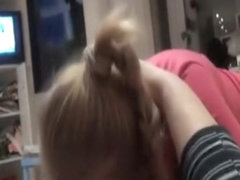 Golden-Haired angel is sucking on a hard strapon