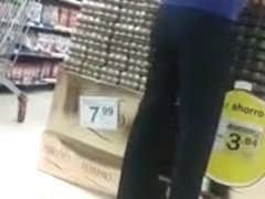 Candid supermarket worker with great ass