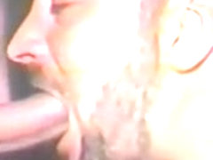 Dudes suck cocks through glory hole in gay porn video