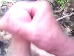 Masturbating outside in the woods, almost caught.