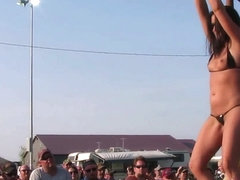 interesting amateur pole stripping contest at a iowa biker rally
