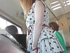 Candid upskirts of the amateur girl in polka dot dress