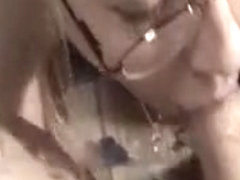 Aged woman in glasses engulfing shlong