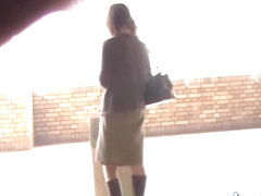 This hot Asian got skirt sharked while smoking a cigarette